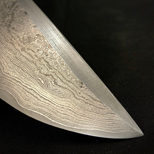 Mehrschichtiger Rohling aus laminiertem Kohlenstoffstahl, handgeschmiedet für die Messerherstellung.