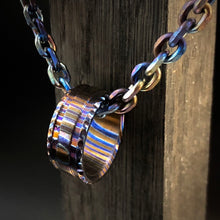 Load image into Gallery viewer, Amulet, Pendant “Fang of Fire 5.0”. Hand Forged Multi-layered, Titanium Forge. Author’s work.
